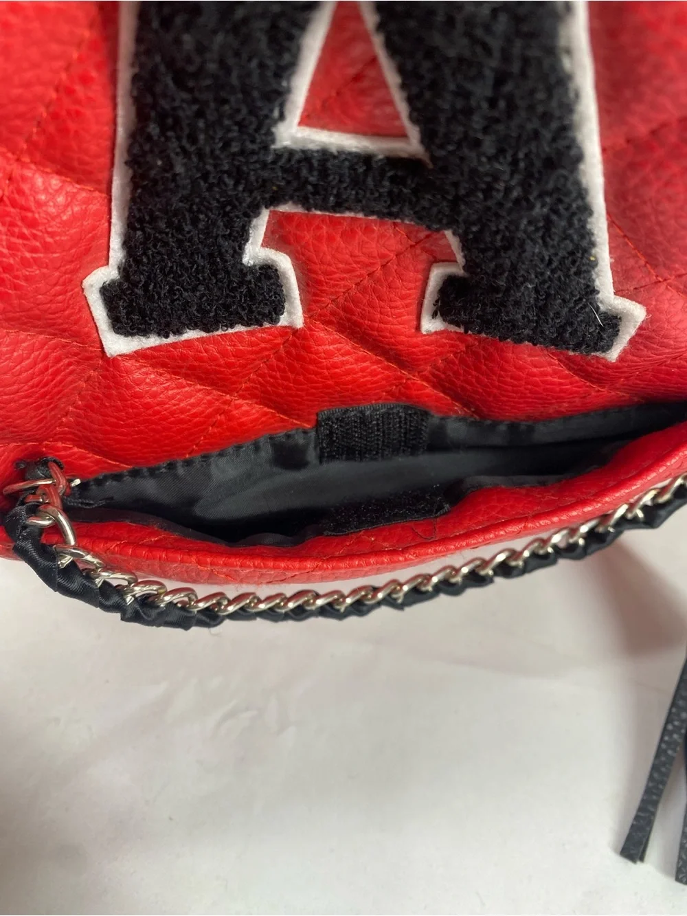 Justice Red Quilted Mini Backpack with Black Patch